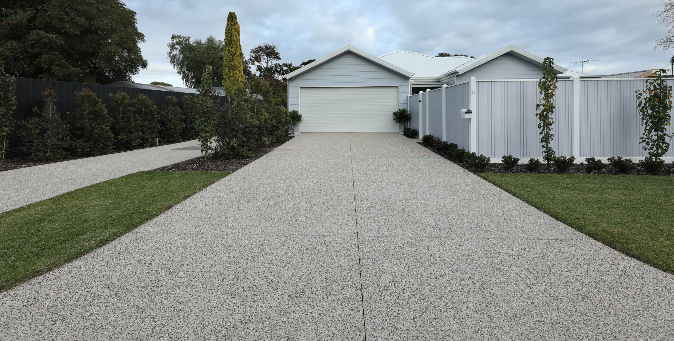 How Much Does a Decorative Concrete Driveway Cost | Holcim Geostone